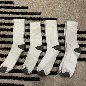 Lot of 4 pairs men’s white athletic socks, size 8-12.  New without tags.